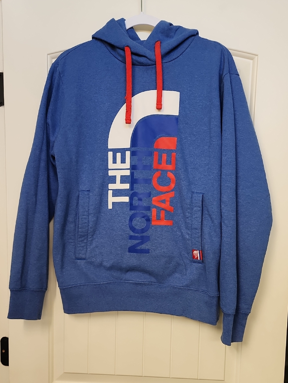 The North Face Blue Pullover Hoodie with Red Drawcords